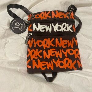 Black and Orange Crossbody Bag with Urban Design